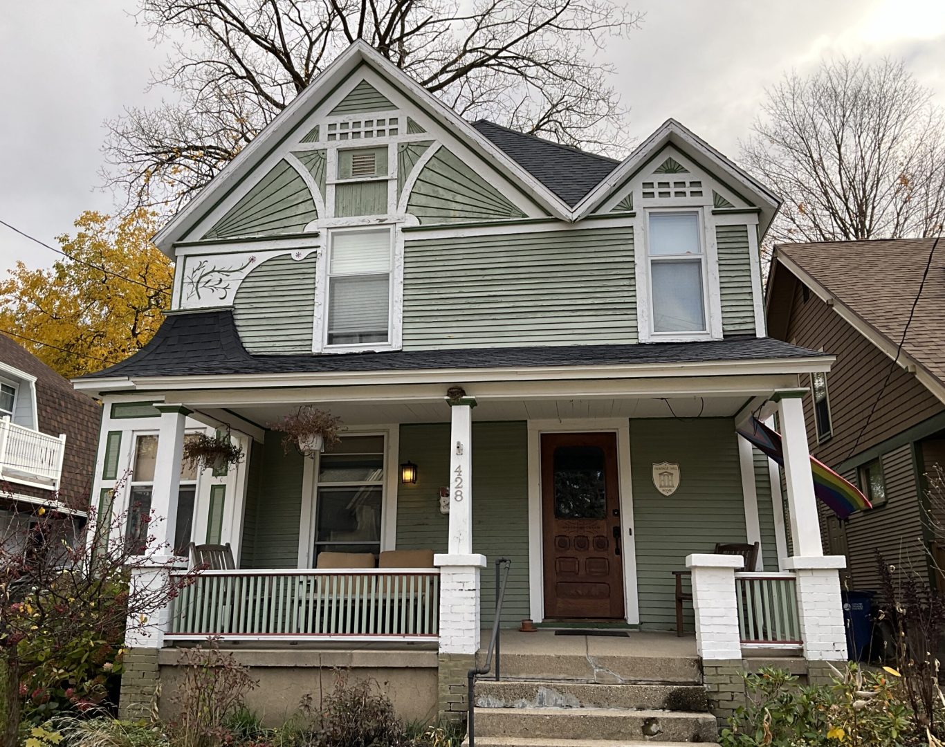 Professional exterior house painting project in Grand Rapids, MI, showcasing a beautifully updated home.